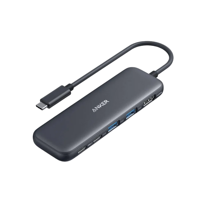 Anker USB hub with multiple ports on a light gray background