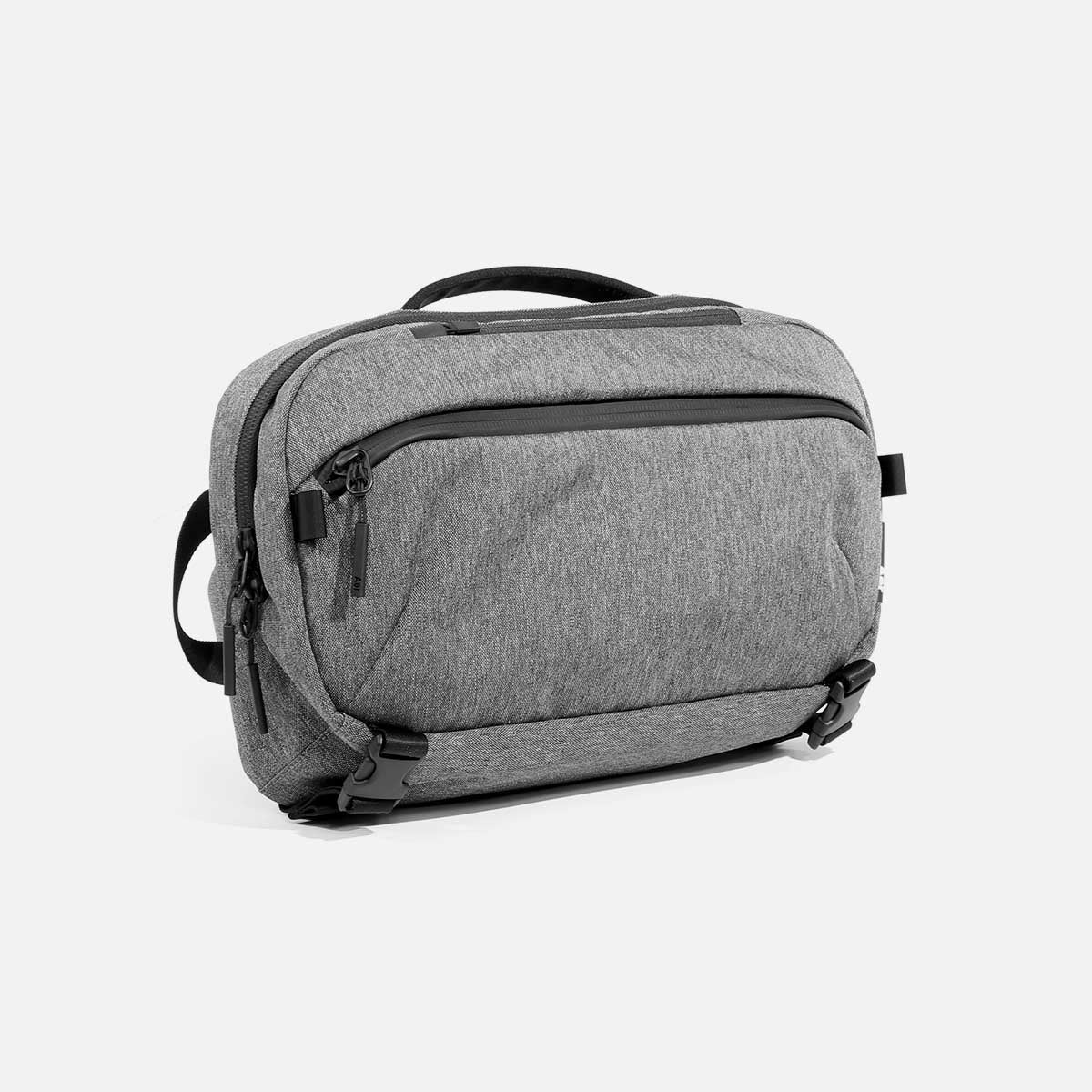 Aer Travel Sling 2 product image - AER22013 travelsling2 gray 34hero