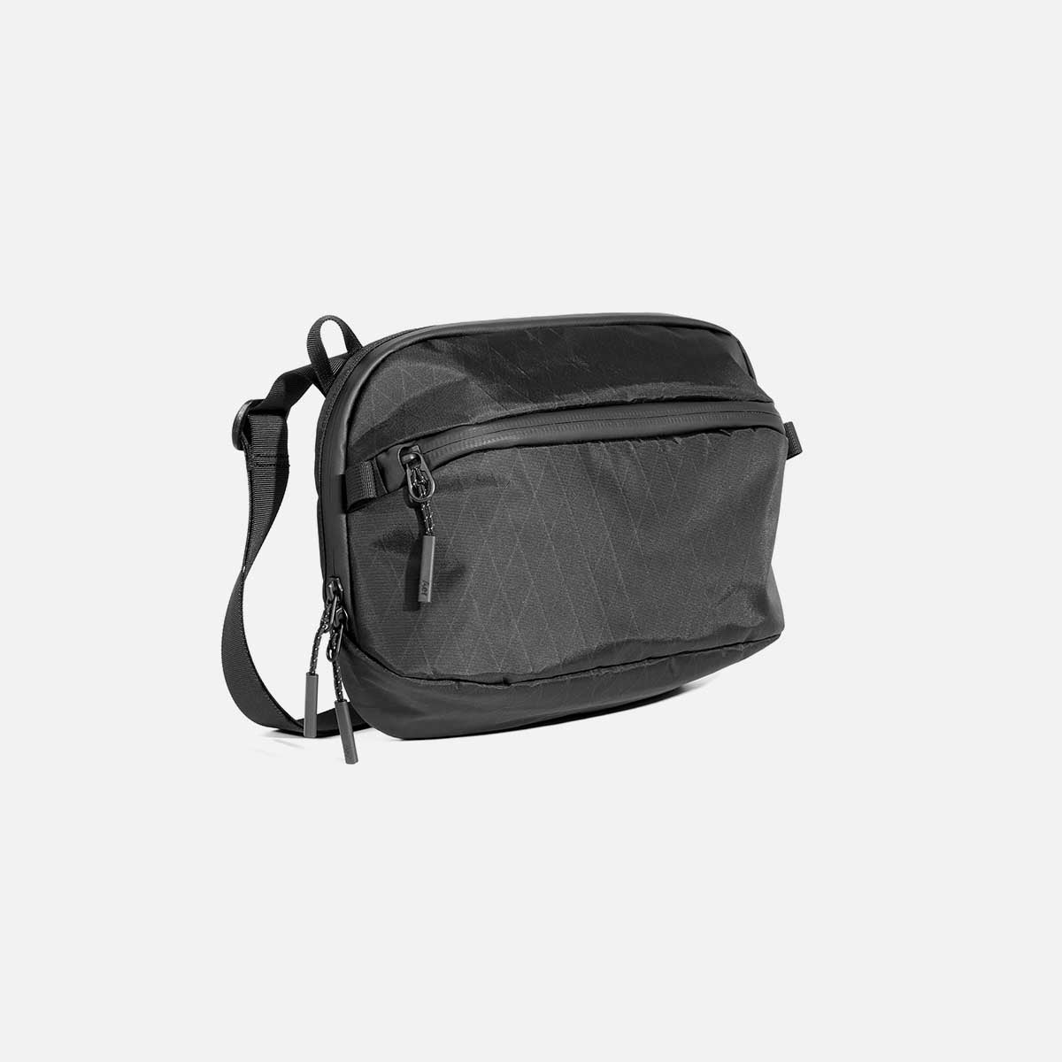 Aer Day Sling 3 Max X-Pac product image - AER29038 daysling3max xpac 34hero fd52a342-1025-4e32-9385-01371fda260a