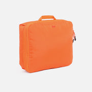 Aer Packing Cube product image - AER29052 packingcube safetyorange 34hero